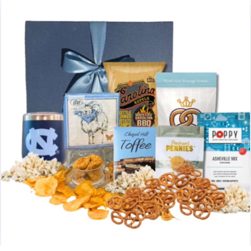 UNC Tar Heels game day gift basket with Chapel Hill tumbler, snacks, and Carolina Blue accessories