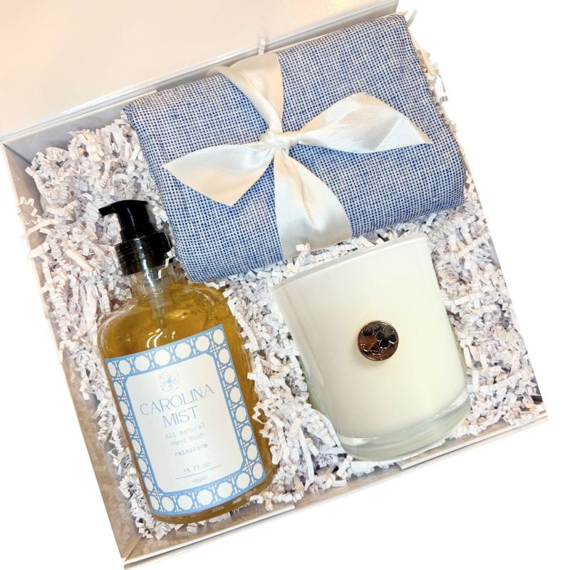 North Carolina housewarming gift box contents with candle, towel, and artisan soap