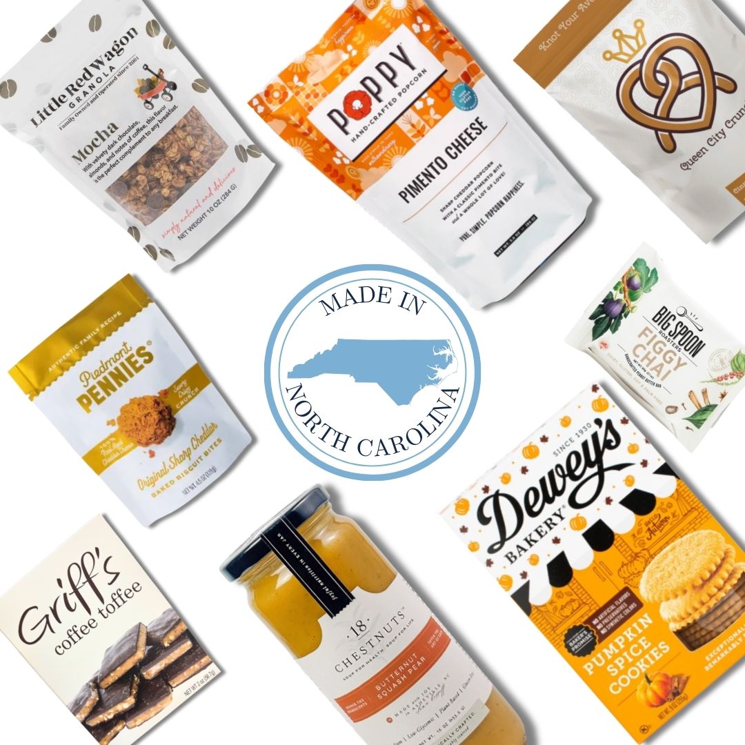 Flat lay of North Carolina-made gourmet products including snacks, soup, and treats, arranged around a central "Made in North Carolina" badge for a local gift basket collection