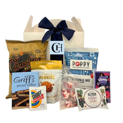 North Carolina wedding welcome box with monogrammed label, filled with locally made snacks and guest essentials, perfect for out-of-town wedding guests