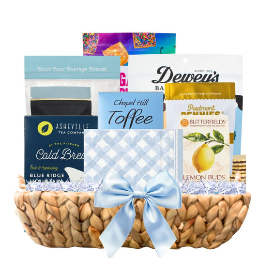 North Carolina spring gift basket with artisan chocolate, toffee, and gourmet treats in hyacinth tray
