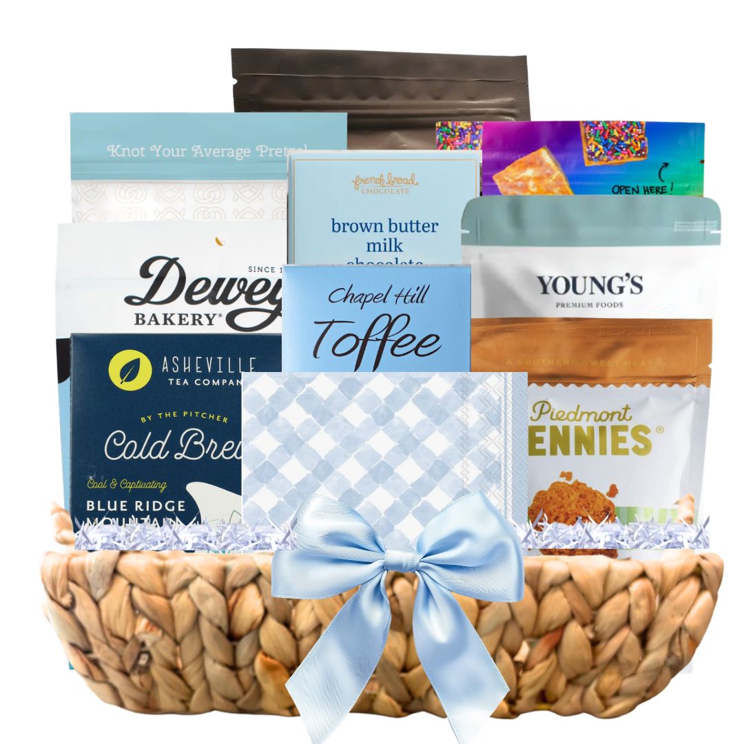 North Carolina spring gift basket with artisan chocolate, toffee, and gourmet treats in hyacinth tray