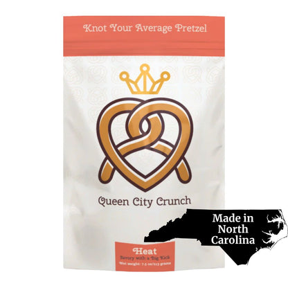 Queen City Crunch Heat Pretzels, savory and spicy snacks made in Charlotte, North Carolina, offering a bold kick of flavor for an unforgettable treat.