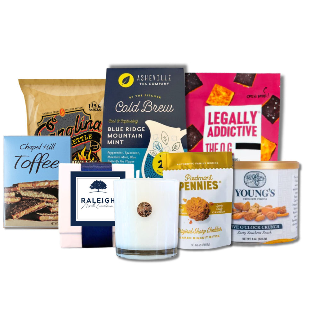 Raleigh NC corporate welcome gift contents featuring Carolina specialty goods and keepsake soy candle from Handpicked Gifts NC