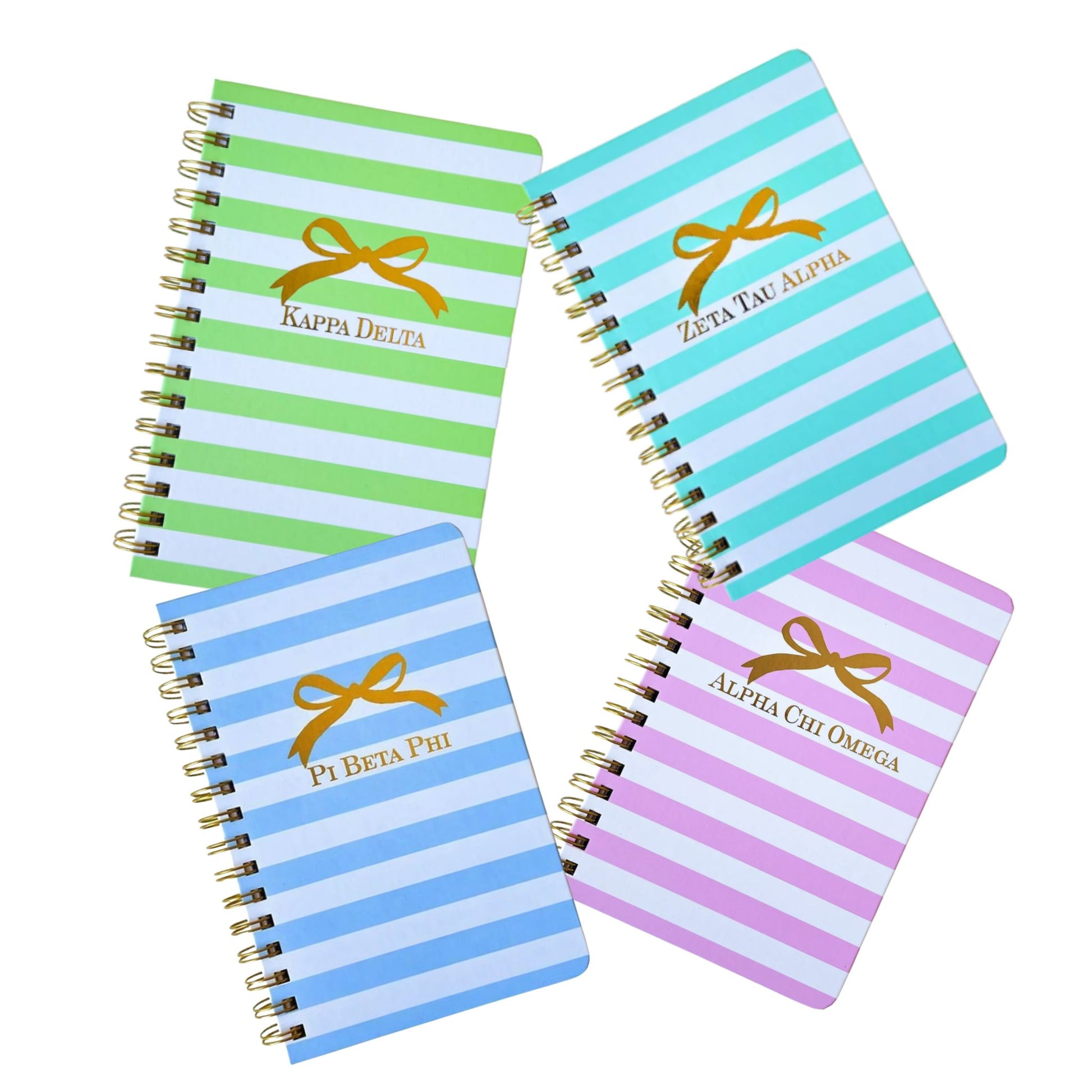 Spiral sorority notebook with gold bow design and sorority letters in sorority colors