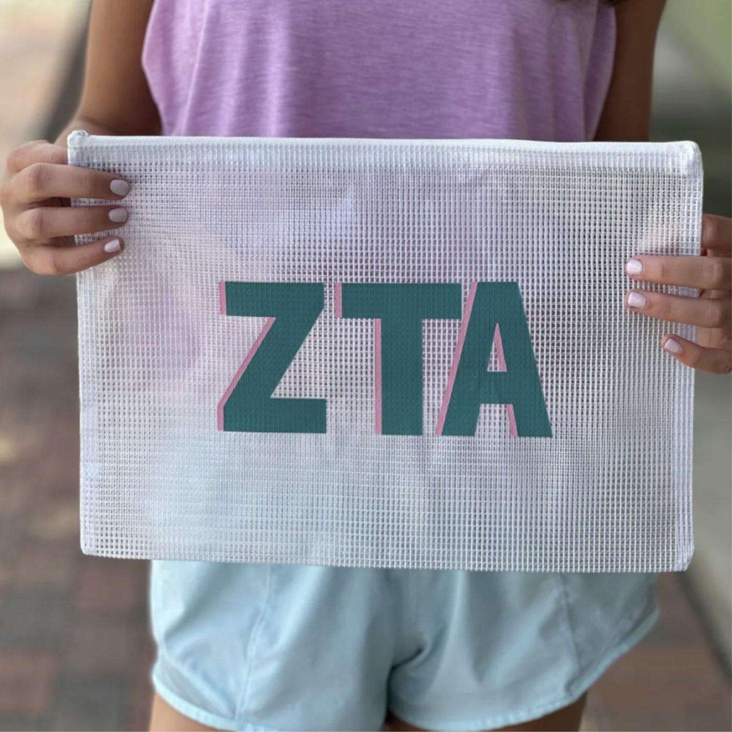 Large mesh zip bag with sorority letters, works as a pool bag, snack bag, or organizer