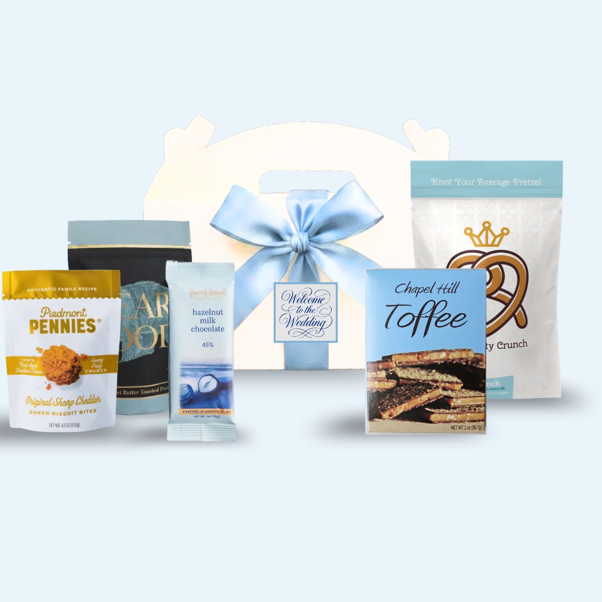 Custom monogram Southern Welcome wedding welcome box with personalized label and light blue ribbon
