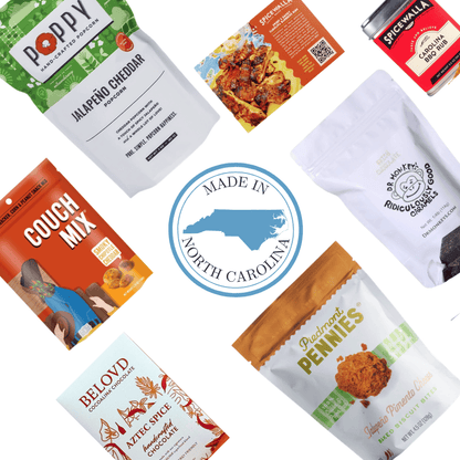 Spicy gourmet gift basket contents with jalapeno popcorn and North Carolina artisan treats for corporate clients