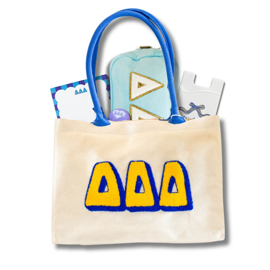 Delta Delta Delta sorority gift bag with Greek letter accessories for UNC Chapel Hill students and bid day