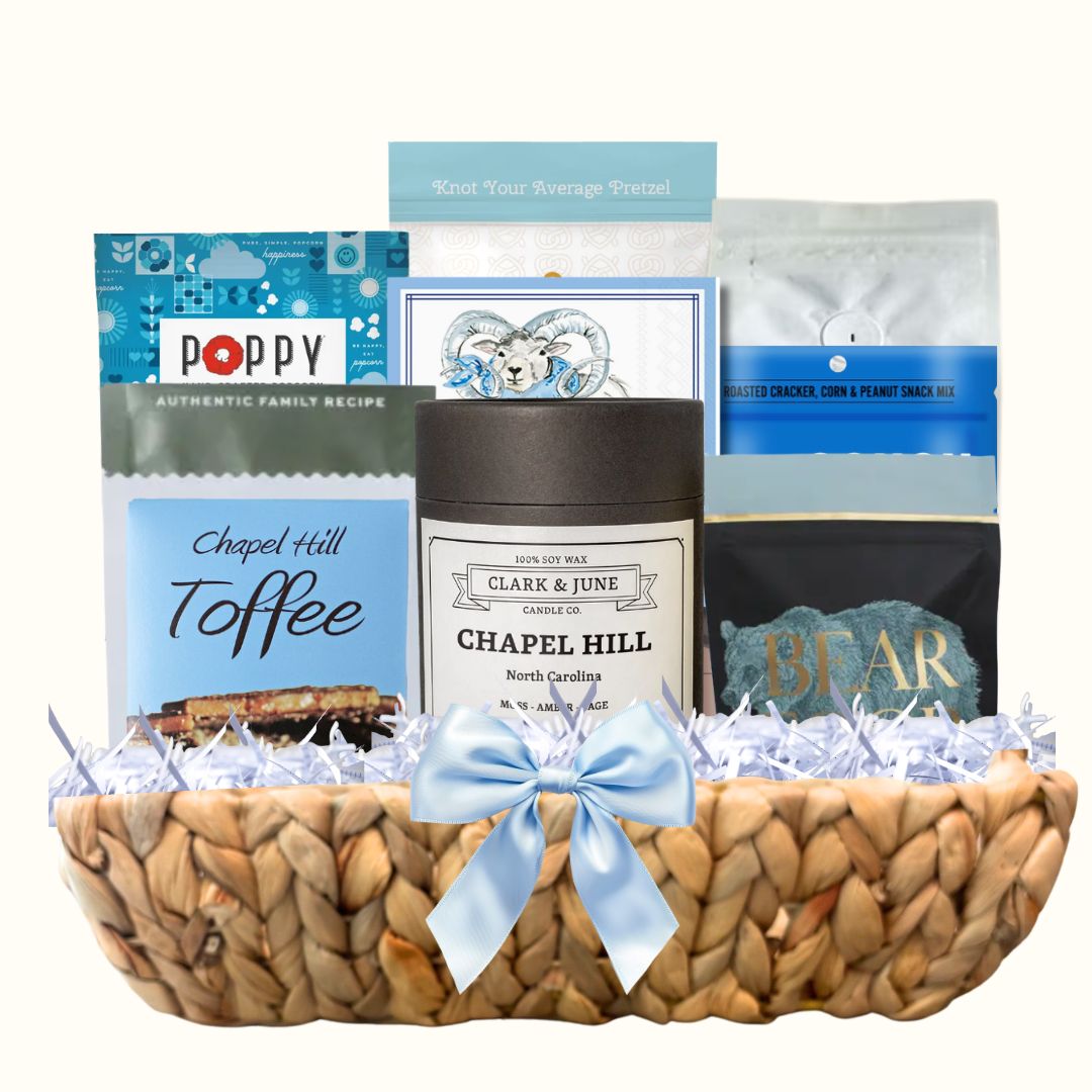 UNC Carolina Blue gift basket with North Carolina artisan treats and keepsake candle for Tar Heel fans