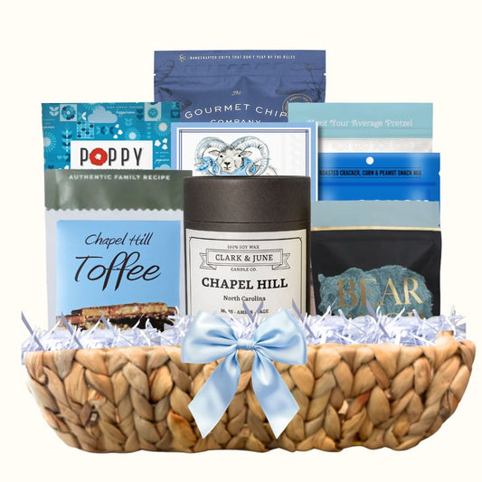 UNC Carolina Blue gift basket with North Carolina artisan treats and keepsake candle for Tar Heel fans