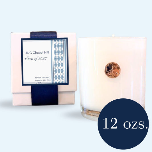 UNC Class of 2026 graduation candle with NC dogwood and Chapel Hill branding in luxury gift box