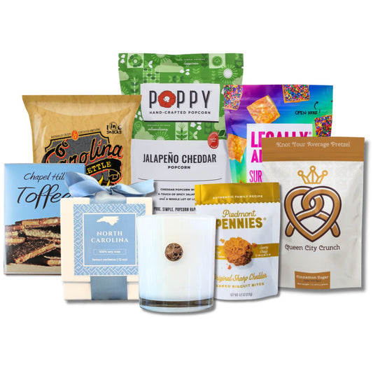 North Carolina welcome gift basket contents with BBQ chips, Chapel Hill Toffee, and artisan tea